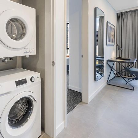 Meriton Suites Μελβούρνη Εξωτερικό φωτογραφία Laundry facilities in a typical apartment