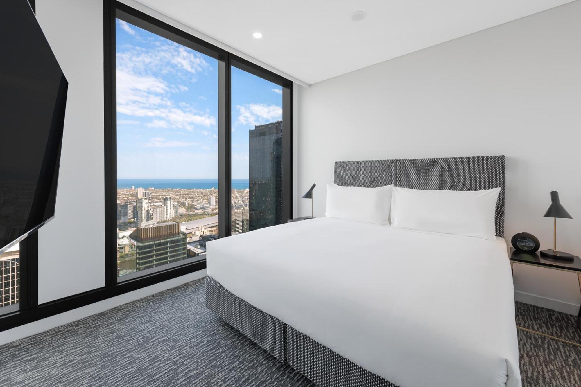 Meriton Suites Μελβούρνη Εξωτερικό φωτογραφία A bedroom in a typical apartment