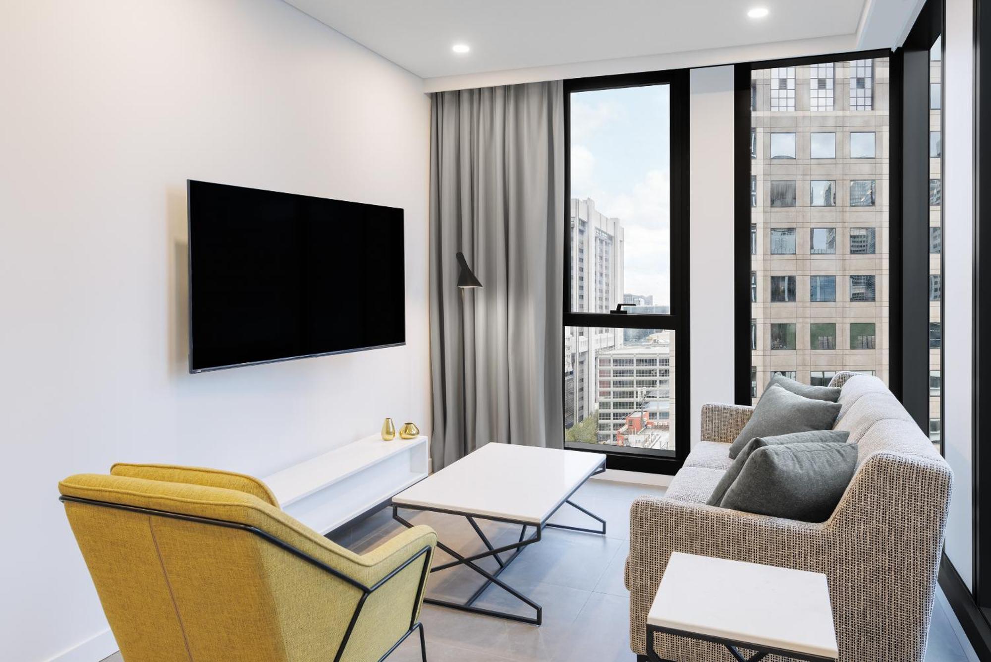Meriton Suites Μελβούρνη Εξωτερικό φωτογραφία A living room